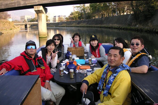 Boat Cruising in Front of the Active Volcano Sakurajima